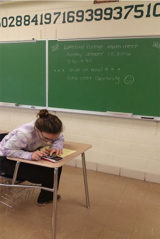 Senior Zoe Schrameyer practices for the upcoming math meet. 62 students from South attended the meet.