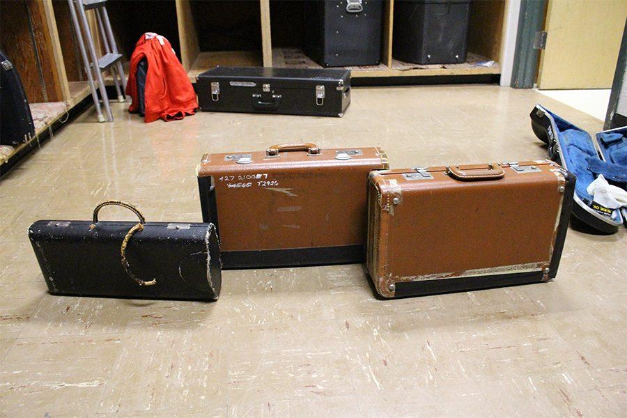 Help Me! Instrument cases show their wear and tear due to replacement and repair costs. 