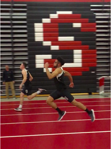 Sophomore Jacksen Wolff and Senior Jacob Case both participate in track and field. They are pictured running the 55 meter dash. 