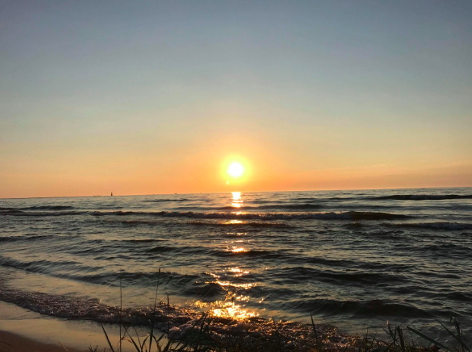 The beach is a great place where friends like to go and hangout the whole summer. The sound of the waves are perfect and relaxing and the view is mesmerizing. 